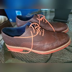 COLE HAAN brown leather wingtip oxfords with orange soles and laces